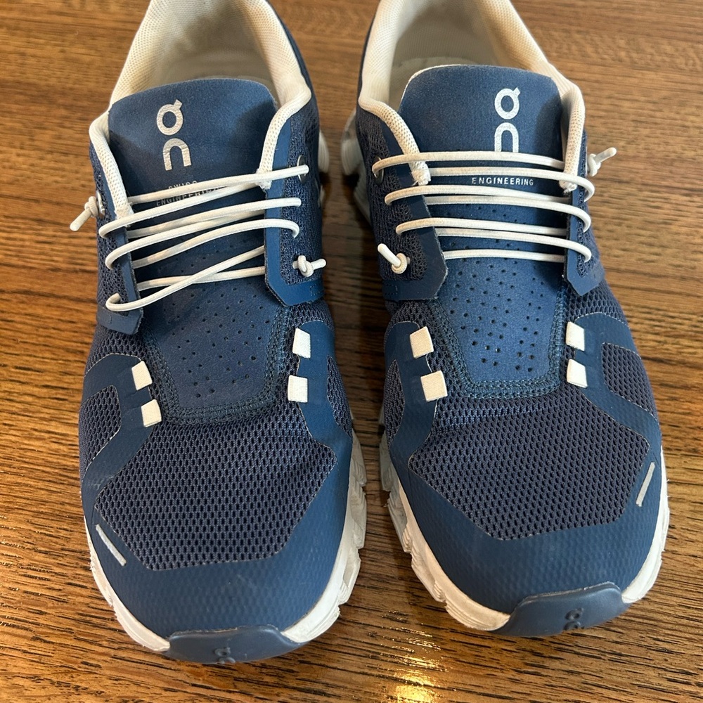 On Running Blue and White Athletic Shoes with Cloud Cushioning